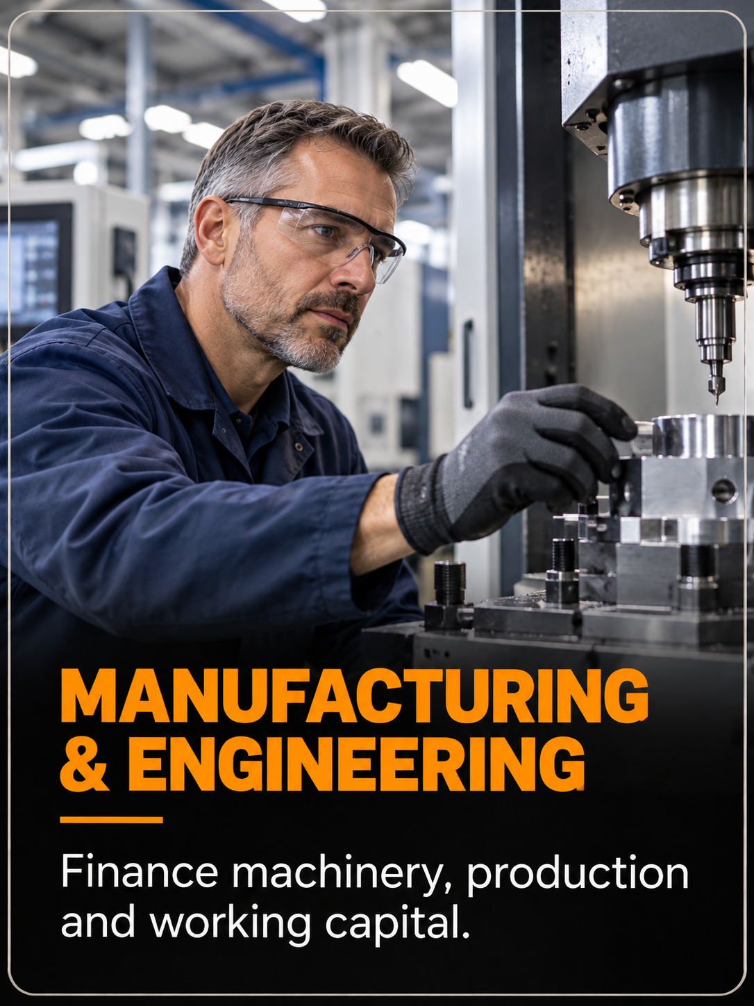 UK manufacturing engineer reviewing production plans beside machinery